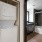 a washer dryer in a room next to a bathroom